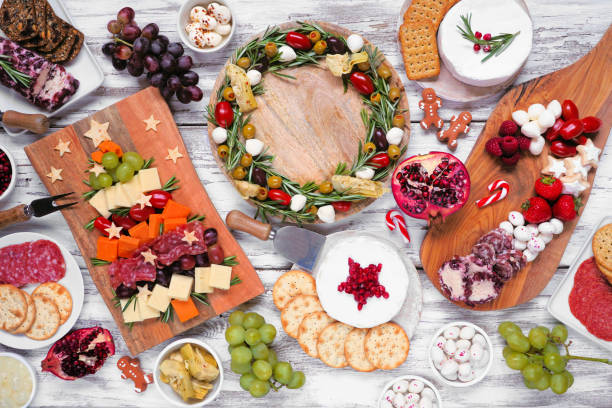 istock Christmas charcuterie table scene over a white wood background 1437539704