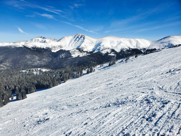 Parsenn Bowl, Winter Park ski resort, Colorado. Continental Divide beyond. stock photo