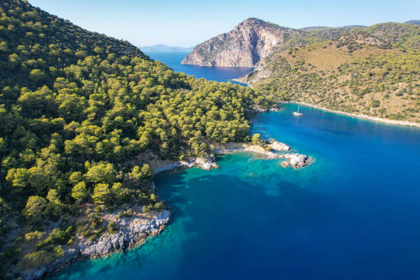 Daily boat trip. Blue voyage. Yacht tour. I took this photo in Darbogaz, one of the bays in Oludeniz neighborhood of Fethiye district of Mugla province in Turkey. marmaris stock pictures, royalty-free photos & images