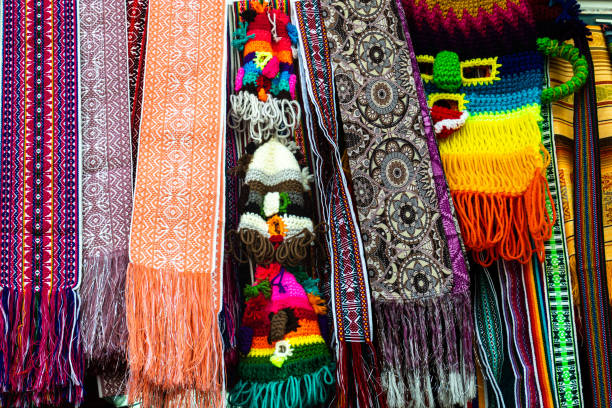 istock Colorful fabric belts, knitted hats and mask, Ecuador 1437551285