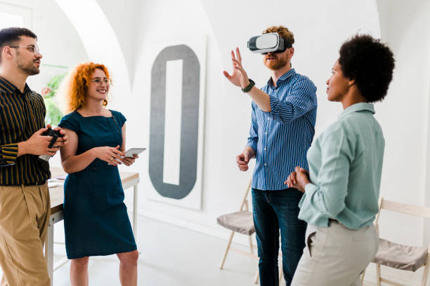 istock Business team presenting new project to a client on a virtual reality simulator. 1437551520