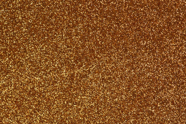 istock Festive background with golden small sequins 1437551572