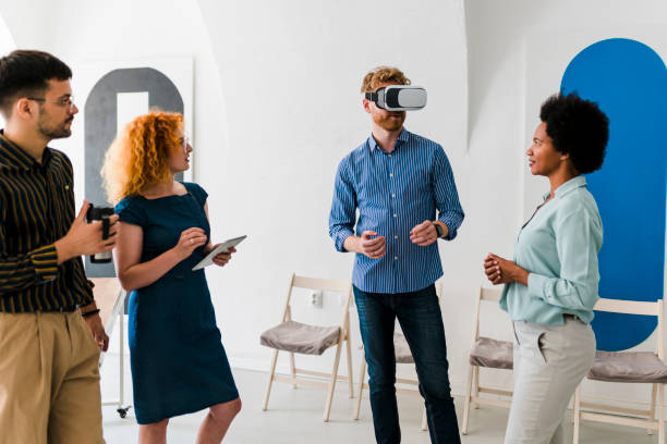 istock Business team presenting new project to a client on a virtual reality simulator. 1437556737