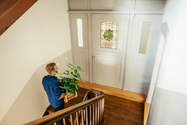 istock Young man relocating in a new apartment 1437559392