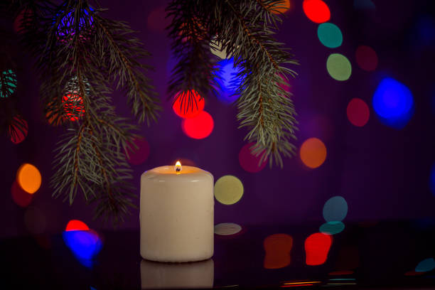 christmas burning candle, sparkling and fabulous background with copy space. christmas background for postcards. christmas decoration concept. - n64 imagens e fotografias de stock