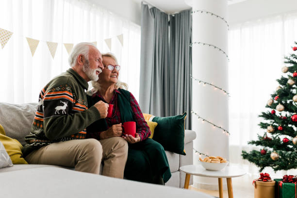 istock Senior couple celebrating new year at home 1437562576