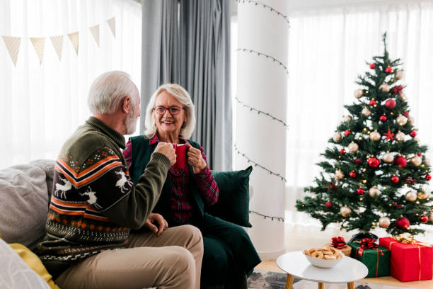 istock Senior couple celebrating new year at home 1437564157
