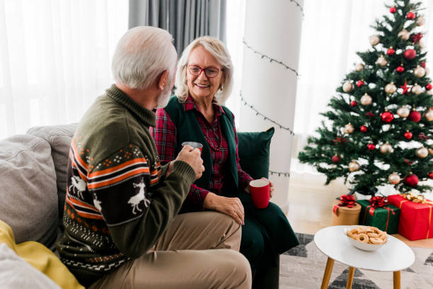 istock Senior couple celebrating new year at home 1437564459