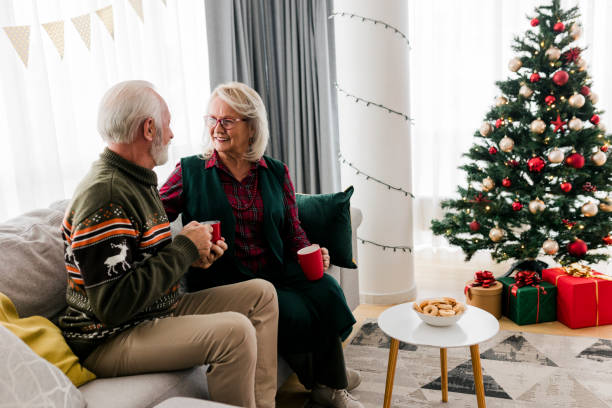 istock Senior couple celebrating new year at home 1437565381