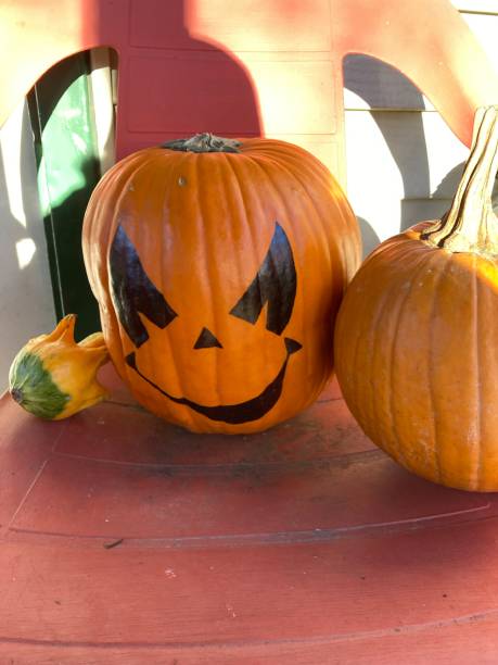 istock Halloween pumpkins on a chair. 1437565486