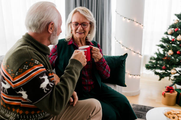 istock Senior couple celebrating new year at home 1437565529
