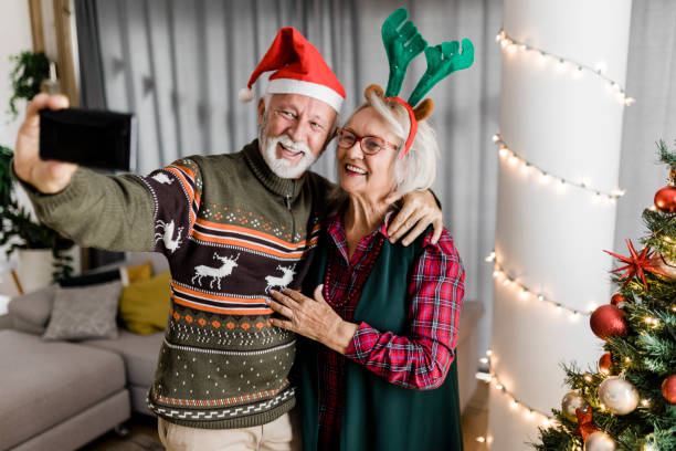 istock Senior couple having video call on New Year's Eve 1437565557