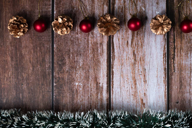 istock Wooden base with available space and Christmas ornaments. 1437565558