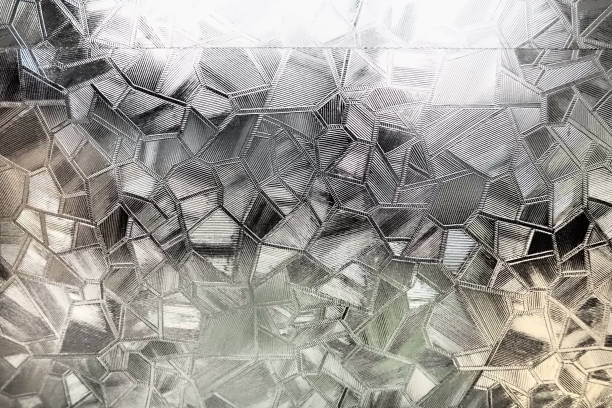 istock Fluted glass with backlight. Beautiful multicolored refraction of light. Abstract background. Self-adhesive film. Ribbed glass surface. Embossed glass background 1437569768