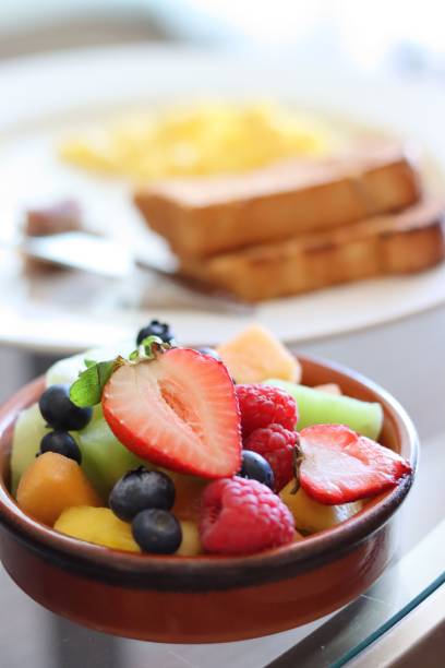 istock Vertical shot of a bowl with fruit for breakfast 1437569883