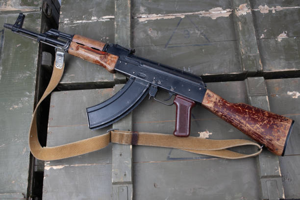istock Kalashnikov AK47 gun on army green crate 1437569914