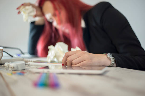 Crumpled paper balls on office desk
