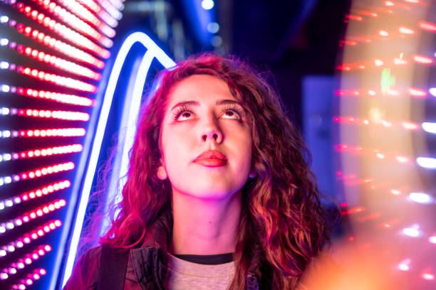 istock Caucasian girl looking up at the red light 1437572061