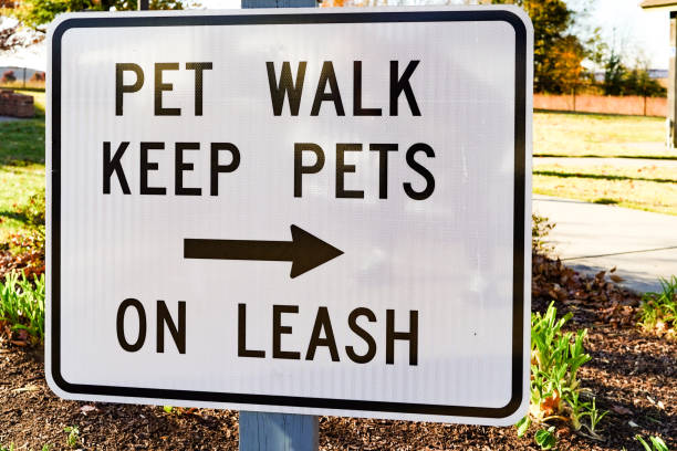 istock Pet Walk, Leash Law Sign 1437572856