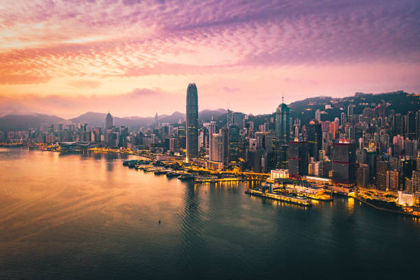 istock Hong Kong - Sunset over Victoria harbour, China 1437572898