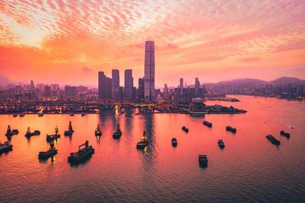 istock Hong Kong - Sunset over Victoria harbour, China 1437572907