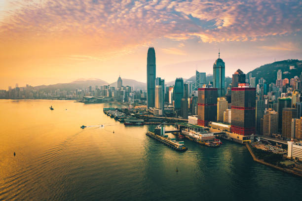 istock Hong Kong - Sunset over Victoria harbour, China 1437572922