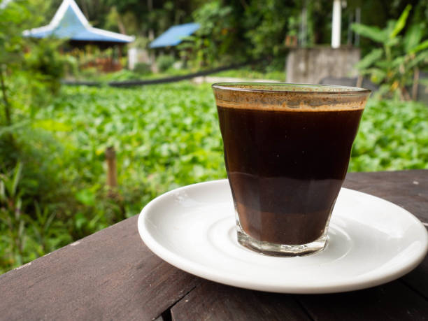 istock A cup of black coffee on a white ceramic plate 1437574838