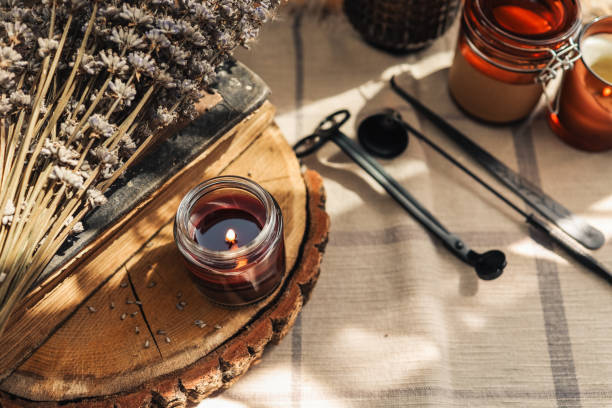 istock Lavender and candles on a old wooden background 1437575087