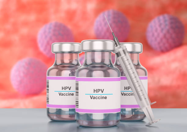 Bottle of human papilloma virus HPV vaccine with syringe stock photo