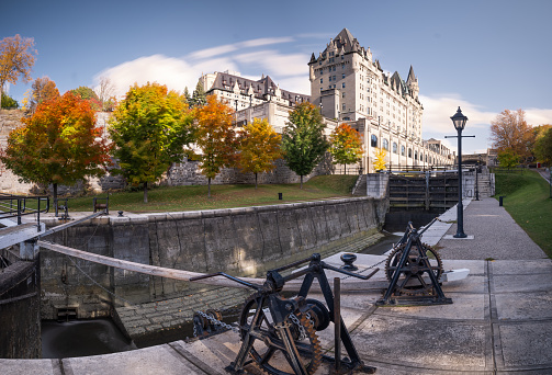 Ottawa, Ontario, Canada - October 14, 2022:  The Chateau Laurier is a luxury, historic hotel in downtown Ottawa.   It is situated where the Ottawa River begins to flow into the Rideau Canal.
