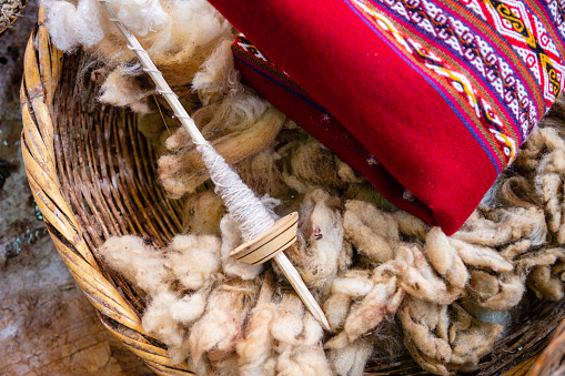 display of alpaca wool inside wicker baskets