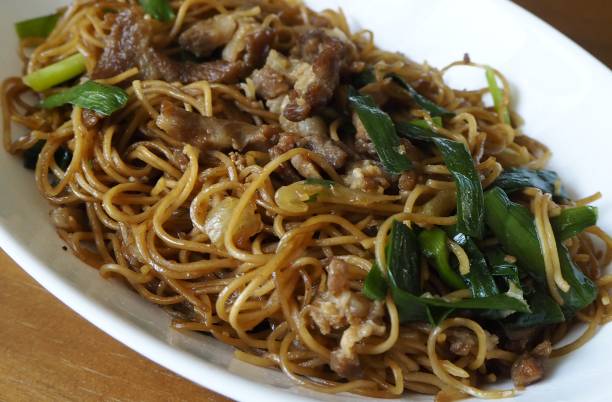 istock Fried noodles with shredded pork 1437587372