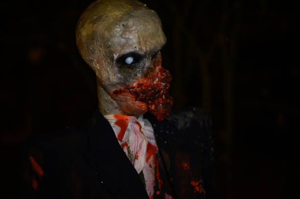 istock Horror zombie dummy as Halloween decoration in darkness 1437588101