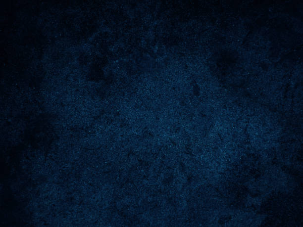 istock Dark rough cement wall background for graphic design or wallpaper. 1437592311
