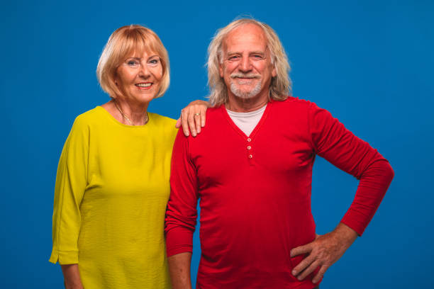 istock Colorful Senior Happy Couple Looking at Camera 1437596060