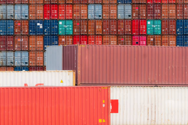 istock Stack of logistics container. Cargo and shipping business. Container ship for export logistics. Logistic industry. Container for truck, ship, and air logistics. Container depot service and transport. 1437596599