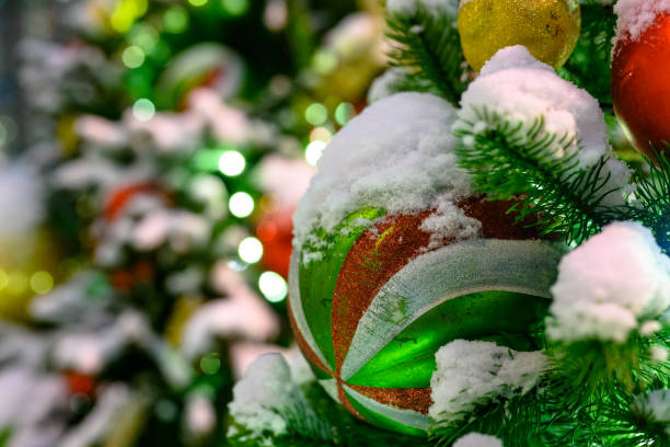 istock Christmas toys in the snow on the tree. 1437627151