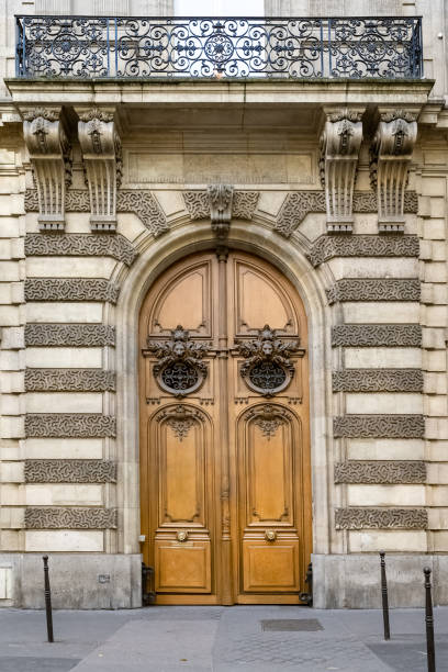istock Paris, an ancient wooden door 1437632620