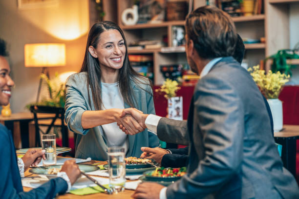 istock Business handshake at the restaurant 1437633735