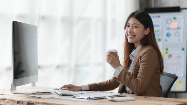 istock Asian Business woman working with computer at home. work from home concept 1437634839