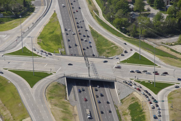 Aerial view of a major interstate highway cloverleaf and overpass in Missouri An aerial view of a major interstate highway cloverleaf and overpass in Missouri major us cities stock pictures, royalty-free photos & images