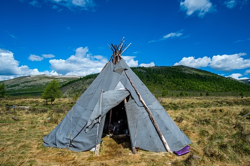 Taos, NM: White Teepee Against Vibrant Blue Sky