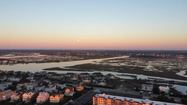 istock Drone shot of a beach town 1437639965