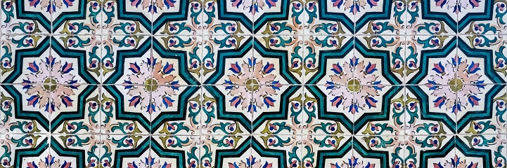 Azulejos in Portugal, detail on a typical house, colorful background