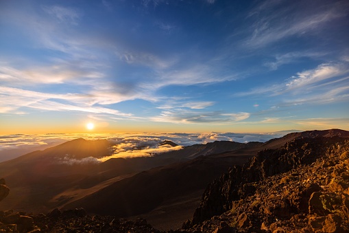 Haleakala, United States – April 27, 2022: Haleakala crater sunrise at Haleakala National Park in Maui, Hawaii