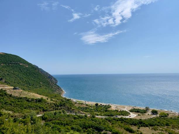 istock Blue sea and shore on a summer day 1437645922
