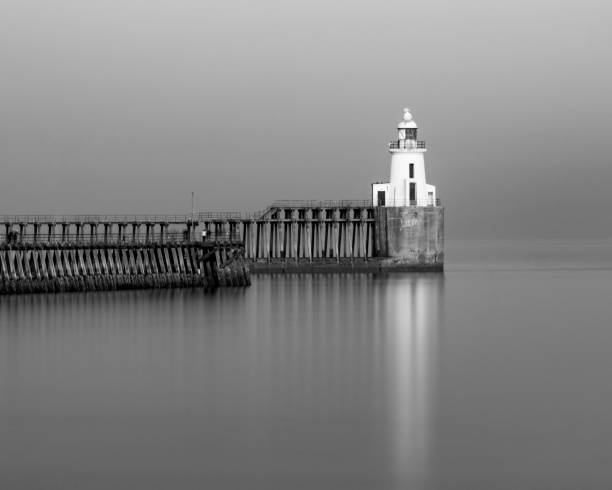 istock Grayscale shot of Blyth High Lighthouse in England 1437645928