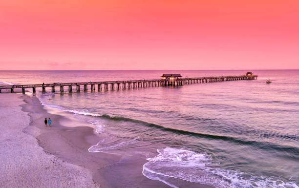 istock Beautiful bridge constructed above the water at sunset 1437646179