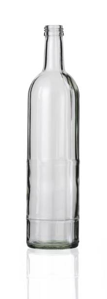 istock Vertical shot of an empty glass bottle isolated on a white background 1437646280