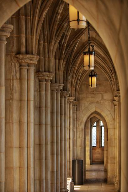 istock Vertical view of the arches in a medieval cathedral hallway 1437646463